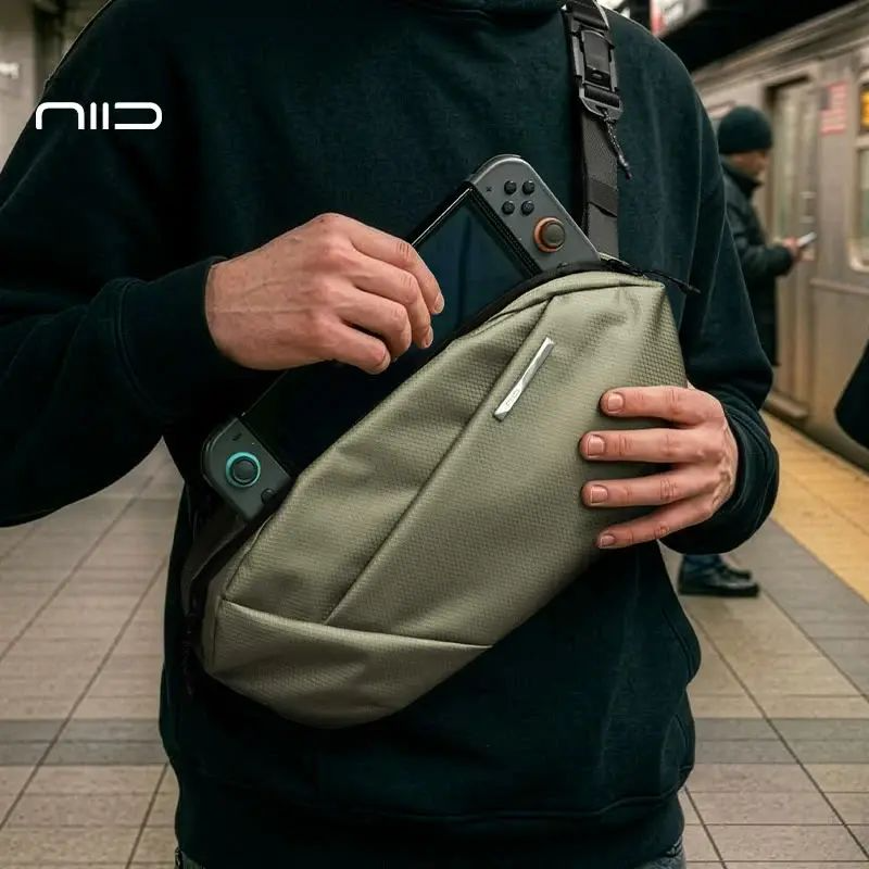 NIID NEO Nomad 系列 Sling N1L LIMO 加長型機能斜肩包 專利快拆磁吸肩扣 可移動解壓寬肩墊 隱藏 AirTag 夾層 數碼遊戲機專用隨身包 石墨色