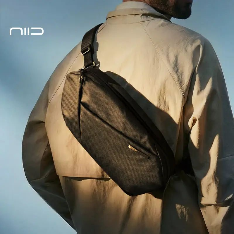 NIID NEO Nomad 系列 Sling N1L LIMO 加長型機能斜肩包 專利快拆磁吸肩扣 可移動解壓寬肩墊 隱藏 AirTag 夾層 數碼遊戲機專用隨身包 石墨色